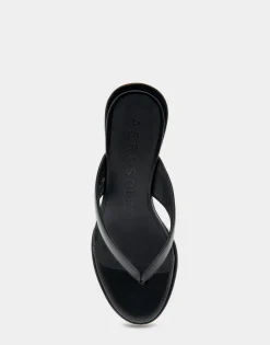 Comfortable Women's Wedge Thong Sandal in Black Allover Faux Leather